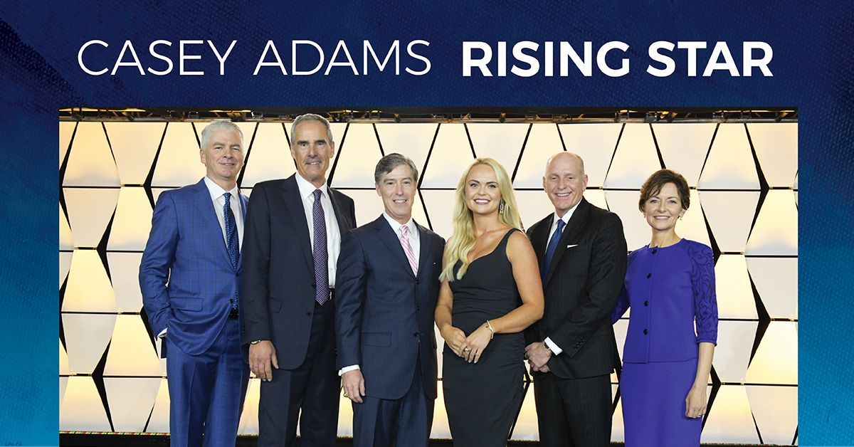 Casey Adams winning the Rising Star Award at the 2023 National Sales and Awards Conference.