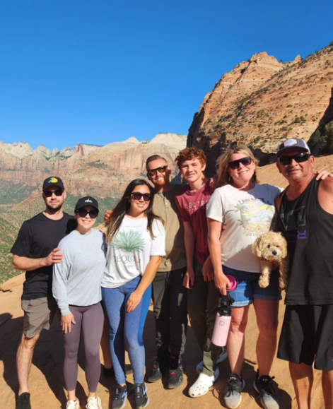 Kim hiking with her family